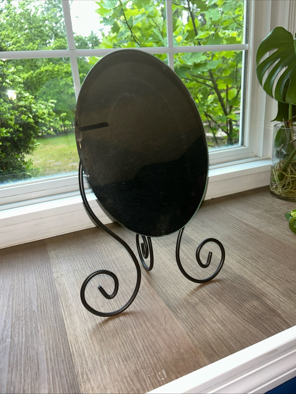 IKEA Black Oval Decorative Mirror with Scroll Stand